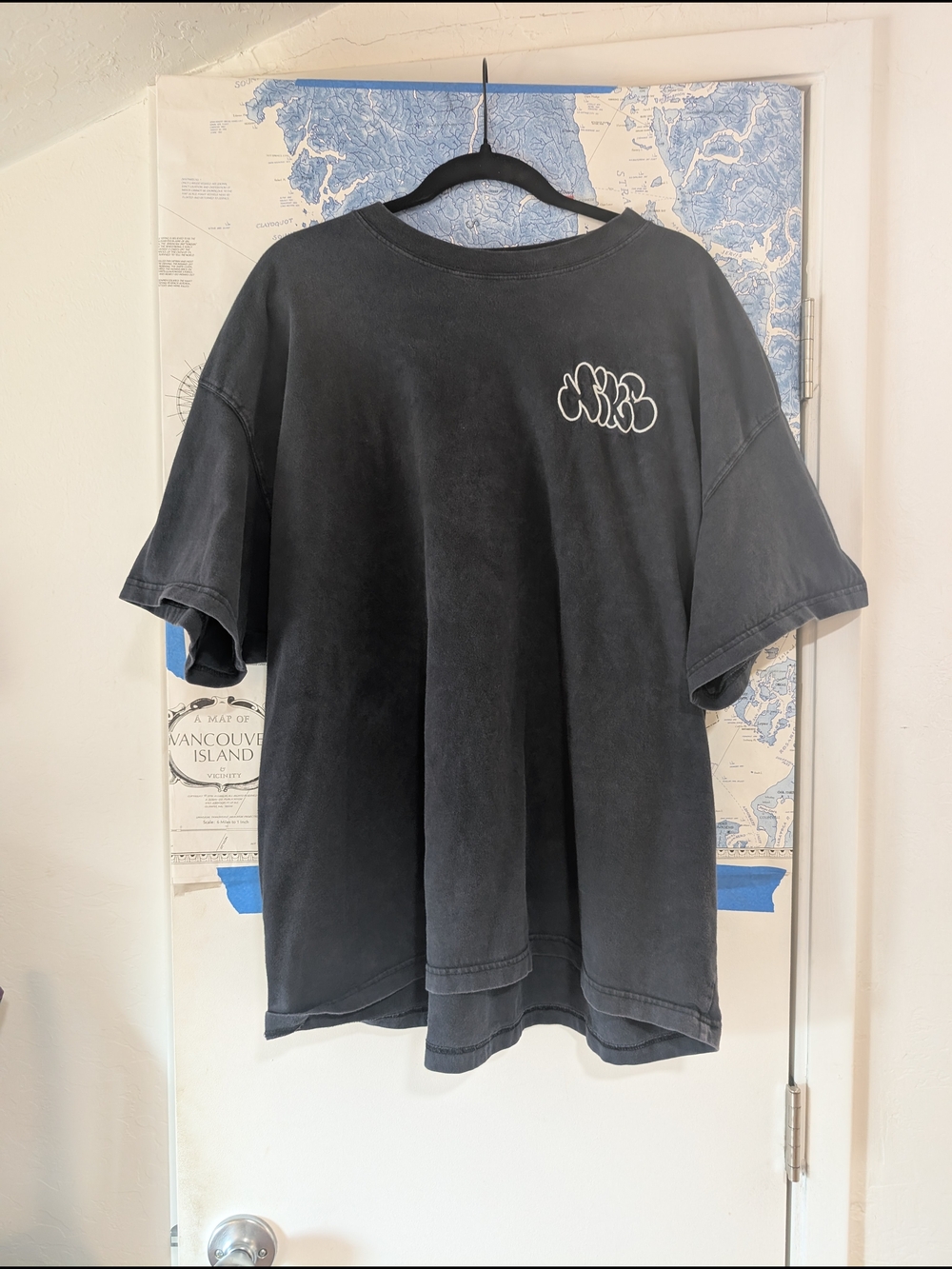Nike Black Short Sleeve Tee with White Chest Graphic